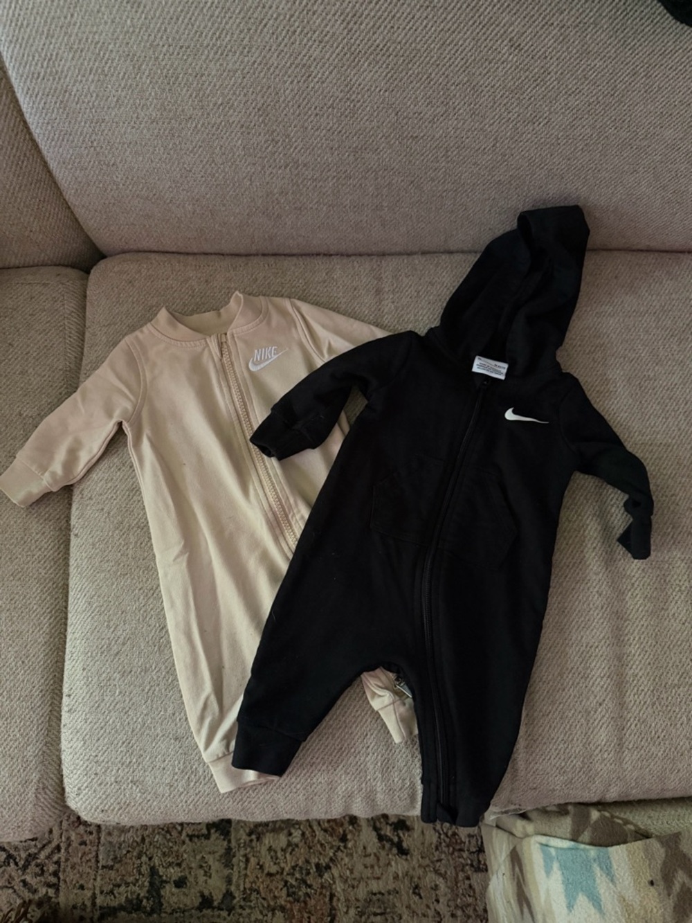 Nike Three-Pack Baby One-Piece Footies in Black and Cream